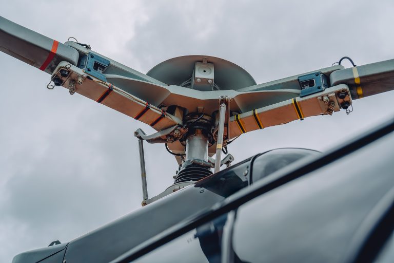 Close up of a helicopter rotor head and blades